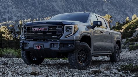 2023 GMC Sierra AT4X AEV Boosts Off-Road Cred in Style - CNET