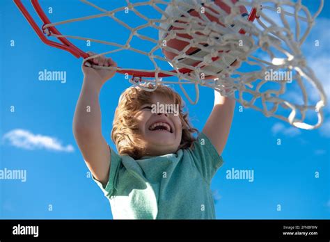 Excited funny kid playing basketball. Closeup child portrait. Funny ...