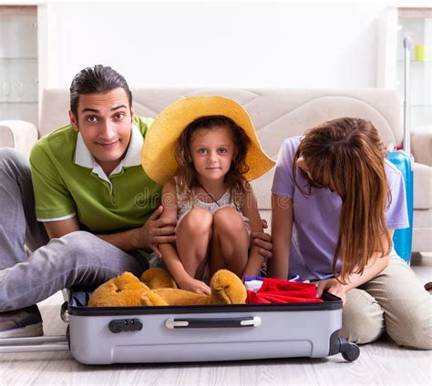 Happy Family Planning Vacation Trip Stock Photo - Image of preparation, packing: 272617986