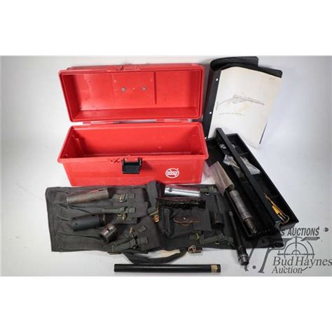 Selection of sten gun parts and a WWII British sten gun paratrooper case Description subject to chan