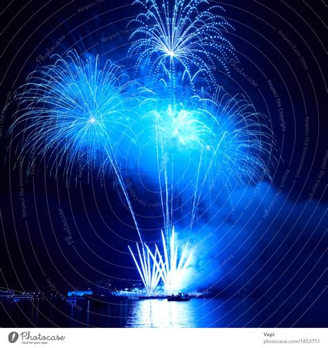 Blue colorful fireworks on the black sky - a Royalty Free Stock Photo ...