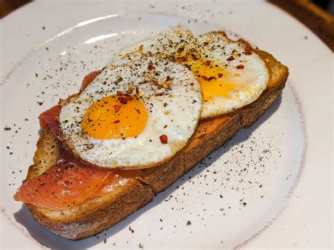 Open-faced smoked salmon breakfast sandwich w/ fried egg, on buttered sourdough : r/Sandwiches