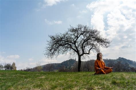 Premium Photo | Young woman do yoga on the mountain meditation