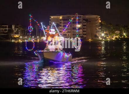 Marco, USA. 20th Dec, 2023. Marco Island Christmas Island Style boat flotilla parade on Marco ...