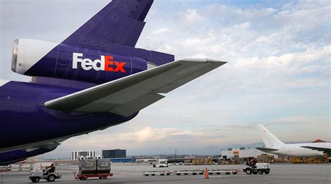 FedEx Plane Logo - LogoDix