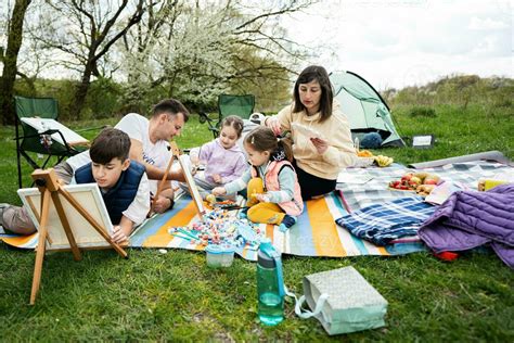 Happy young family with four children having fun and enjoying outdoor ...