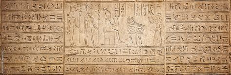 Old Egyptian hieroglyphs on an ancient background. Wide historical ...