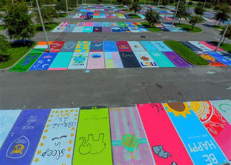 High School Students Encouraged to Paint Their Parking Spots | Be More Awesome