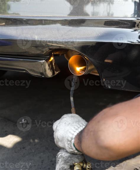 Repairing exhaust pipe 11388763 Stock Photo at Vecteezy