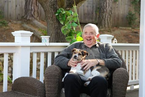 Happy Elderly Man with Dog stock image. Image of pensioner - 13201689