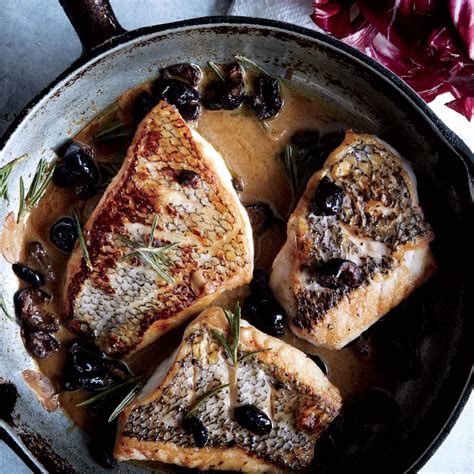 Black Bass with Warm Rosemary-Olive Vinaigrette Recipe | Epicurious