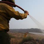 Western Wildfires Consume Manpower and Acreage - The New York Times