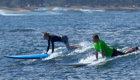 Emma Stone Surfing Photos: 2014 in Hawaii -14 | GotCeleb