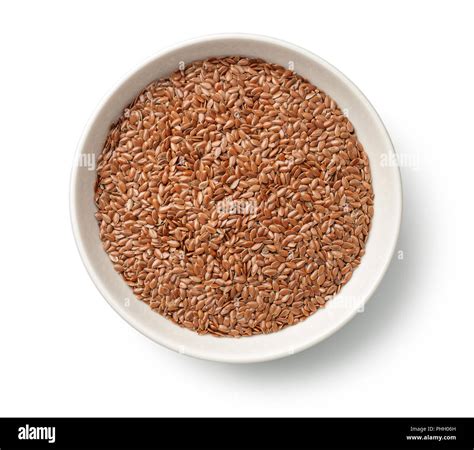 Flax Seed in Bowl Isolated on White Background Stock Photo - Alamy