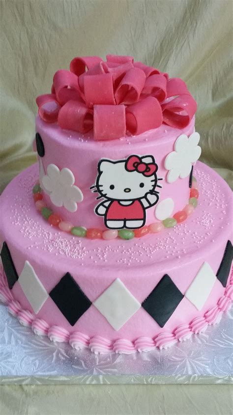 2-tier buttercream finished Hello Kitty birthday cake with fondant appliques and bow. | Hello ...