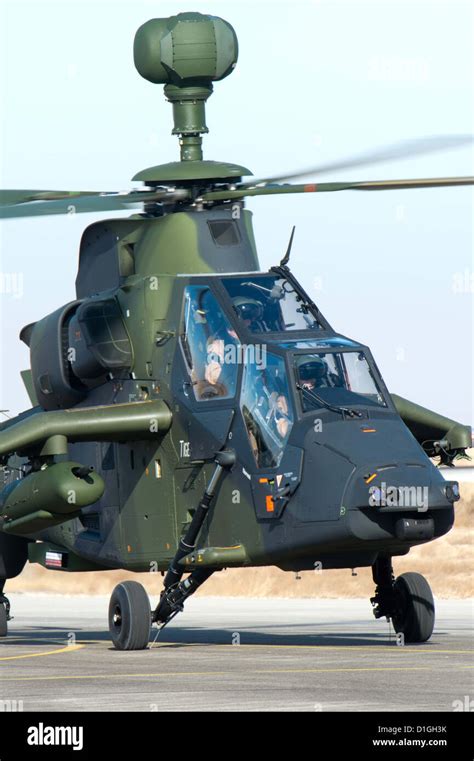 A Tiger combat helicopter stands on stand-by on a military airfield in ...