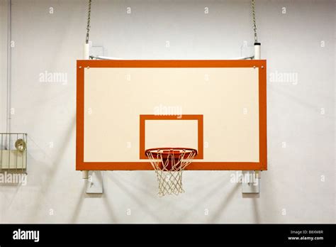 Indoor Basketball Hoop in School Gymnasium Stock Photo - Alamy