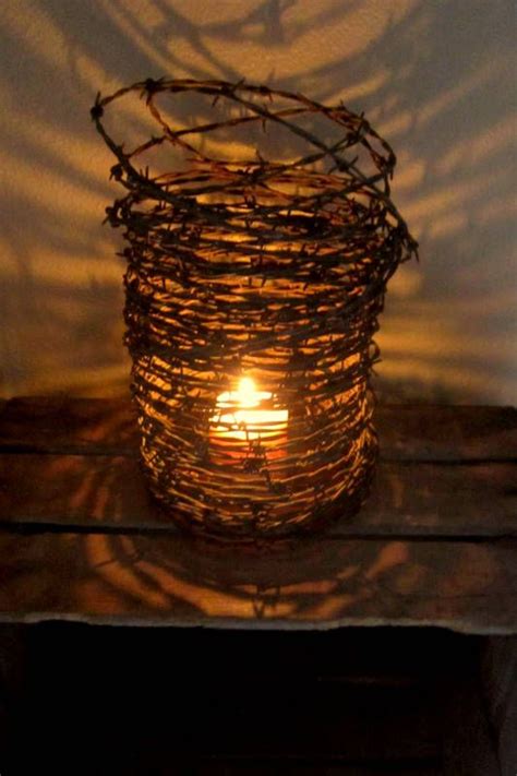 Create a Rustic Atmosphere- Barbed Wire and Candle | Barbed wire decor, Barbed wire art, Barb ...