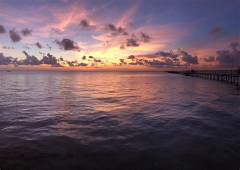 Sunset from the Sea Isle pier : r/galveston