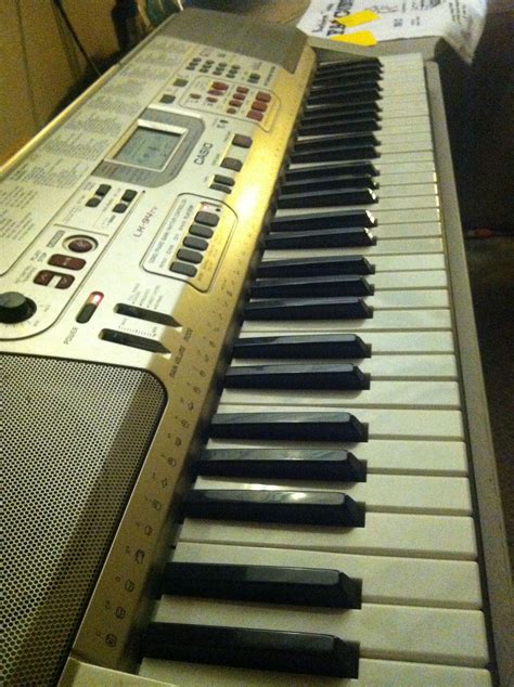 Casio light up Keyboard w/ an extra broken keyboard for spare parts ...