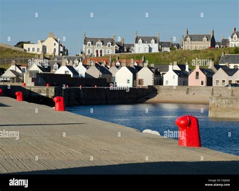 Findochty harbour with gable ends of cottages and red moorings - Moray ...