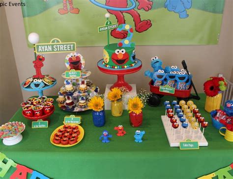 the table is set up for an sesame street birthday party