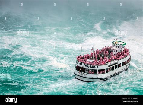 Niagara Falls - OCTOBER 06, 2018: The Maid of the Mist boat near waterfall at Niagara falls ...