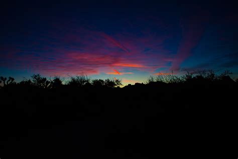 Silhouette of hill at sunset, Joshua Tree National Park, landscape ...