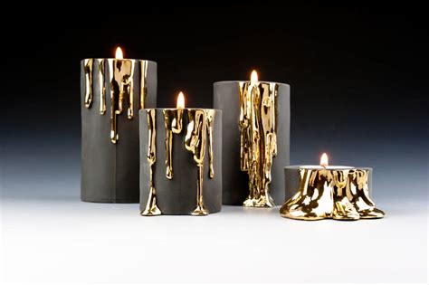 Black Candle Holders With Dripping Gold By Kina Ceramics | notonthehighstreet.com