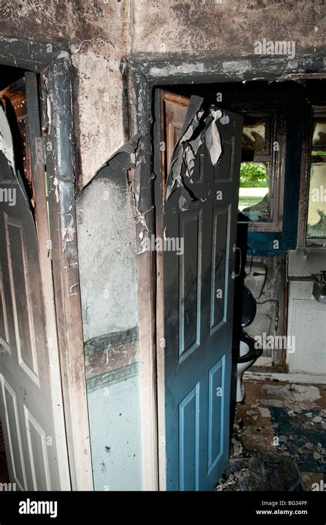 House fire damage to landing and bedroom door Stock Photo - Alamy