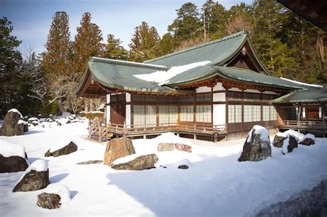 Premium Photo | Temple in japan in winter snow covered