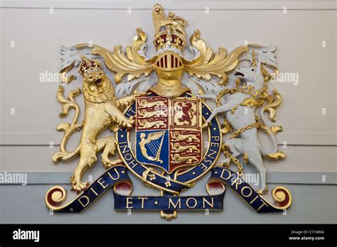 The Royal Coat of Arms that appears in all court rooms in England. The official coat of arms of ...