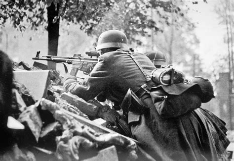 German soldier armed with StG 44, maintains defensive position during ...