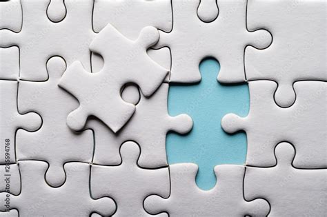 Jigsaw puzzle with missing piece. Missing puzzle pieces Stock Photo | Adobe Stock