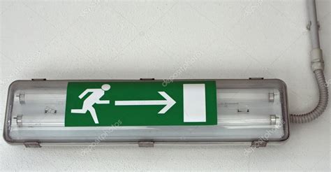 Emergency exit sign installed within a European factory Stock Photo by ...