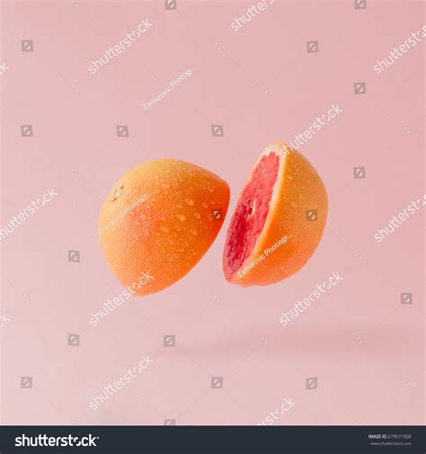 Grapefruit Sliced On Pastel Pink Background Stock Photo (Edit Now) 679571908