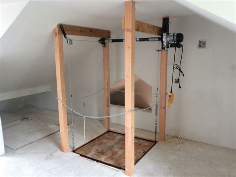 The Attic Lift - Utilize your attic space for more efficient storage instead of just j… | Garage ...