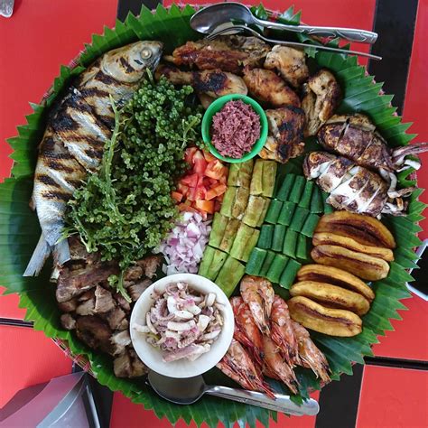 [I ate] a platter of grilled meat seafood and veggies in Alaminos ...