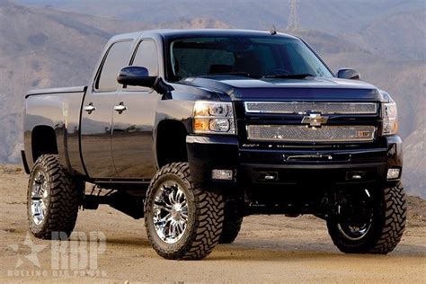 Lifted Chevy and in Navy Blue! I prefer brown but this one I like! | Big trucks, Trucks ...