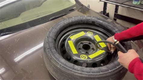 Weird offset Audi Spare Tire Q5 Q7 space saver inflation instructions / demonstration how 2 fill ...