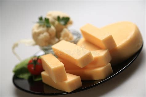 Different Types of Cheese Slices Stock Photo - Image of food, green ...