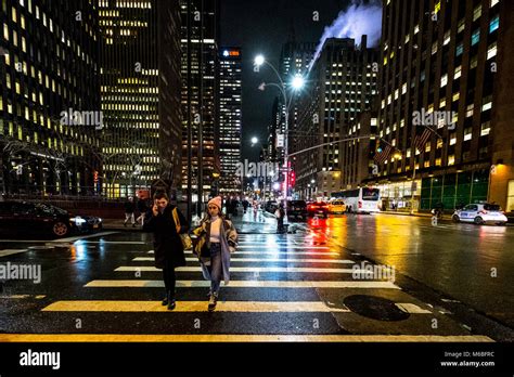 New York City, USA, midtown dark evening night illuminated street road ...