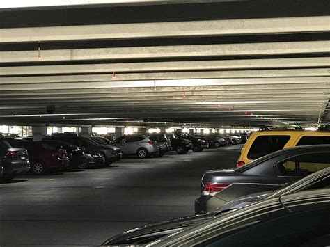 This mall parking lot has indicators above each spot to say if someone is parked there or not ...