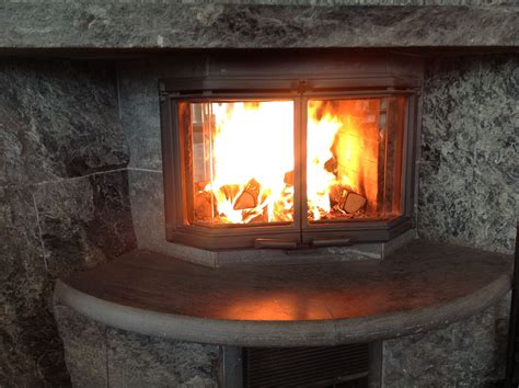 Tulikivi soapstone fireplace will keep you warm. www.tulikivi.fi Fireplace Hearth, Home ...