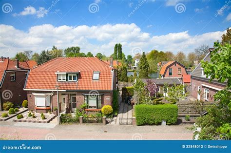 Traditional dutch houses stock image. Image of river - 32848013