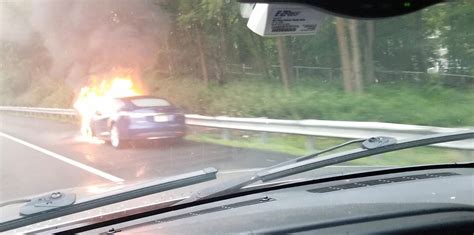 A Tesla Model S caught on fire on the highway after 'hitting a ...