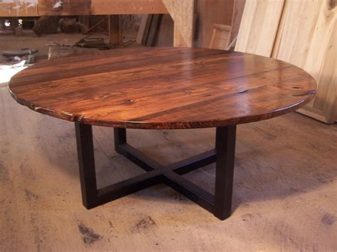 Large round coffee table with industrial metal base. $525.00, via Etsy ...