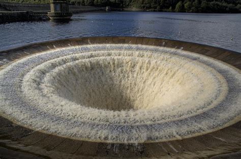 Bell-Mouth Spillways: How Giant Holes in the Water are Possible ...