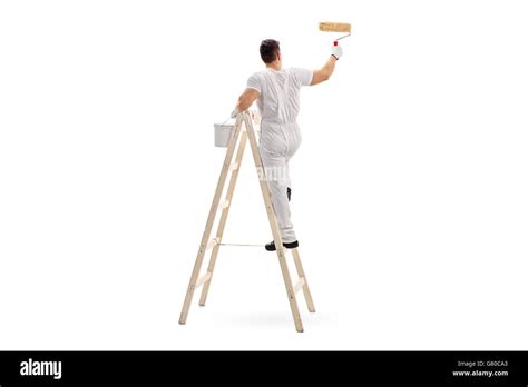 Man up ladder painting Cut Out Stock Images & Pictures - Alamy