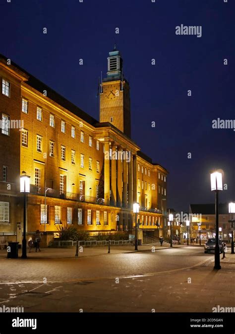 Norwich City Hall with its Clock Tower and lit outside lanterns ...